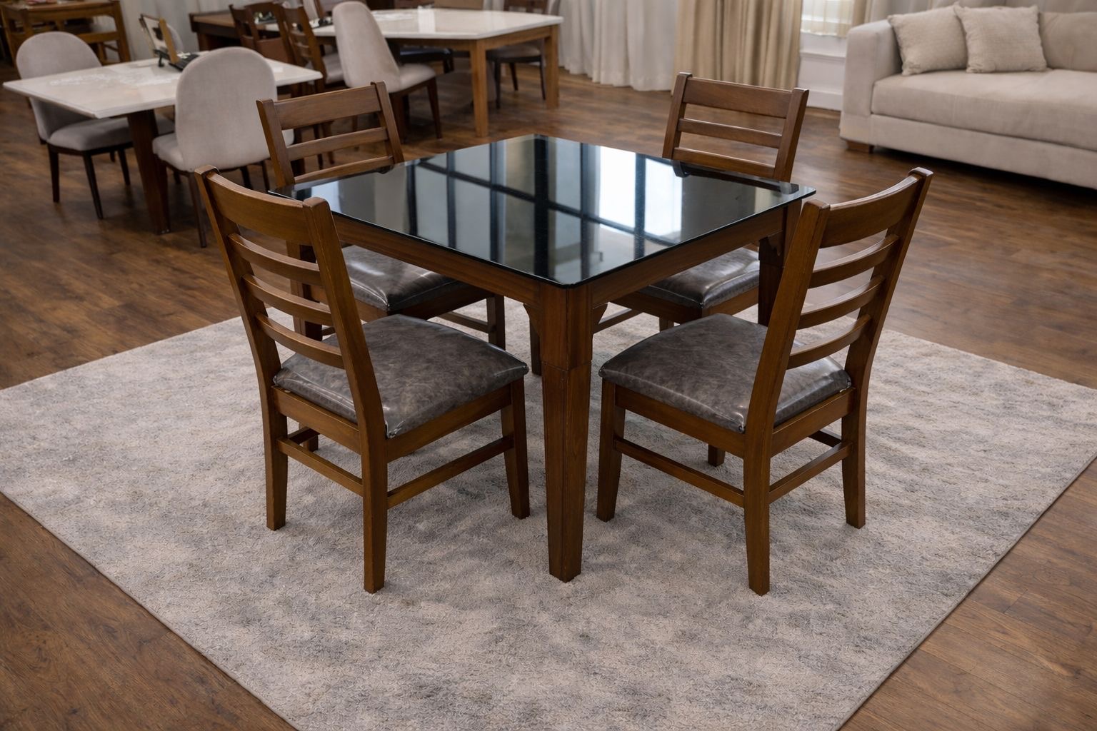 Glass top with brown chairs